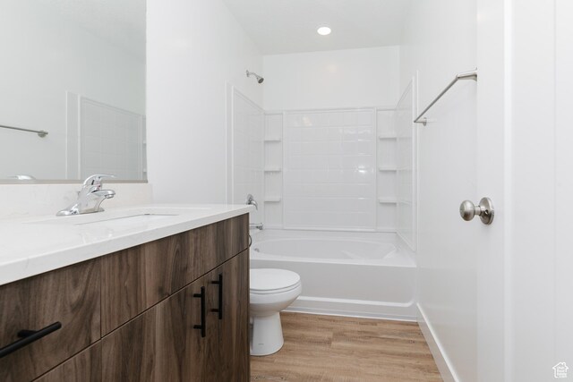 3291 S 1000 W, Nibley, UT 84321 - full bathroom featuring tub / shower combination, wood finished floors, toilet, and vanity