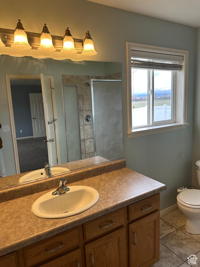 706 S 1690 W, Logan, UT 84321 - full bathroom with a stall shower, tile patterned floors, toilet, vanity, and baseboards