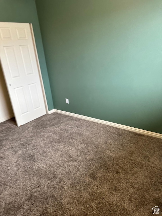 706 S 1690 W, Logan, UT 84321 - spare room with baseboards and dark colored carpet