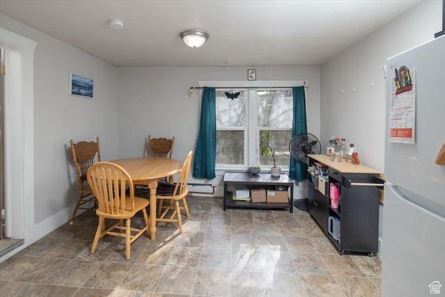 263 W Center St, Logan, UT 84321 - dining space with baseboards