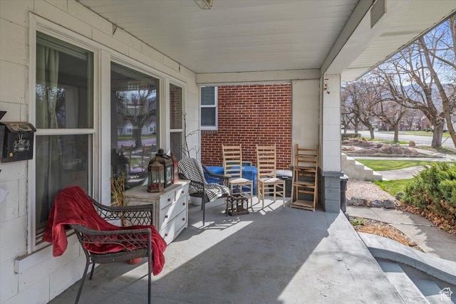 263 W Center St, Logan, UT 84321 - view of patio / terrace featuring covered porch