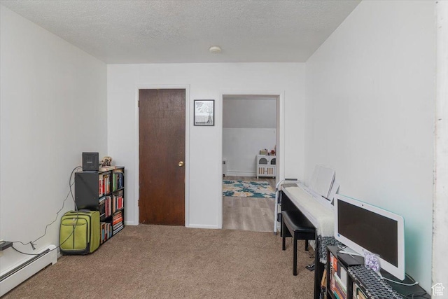 263 W Center St, Logan, UT 84321 - office with a baseboard radiator, carpet flooring, and a textured ceiling