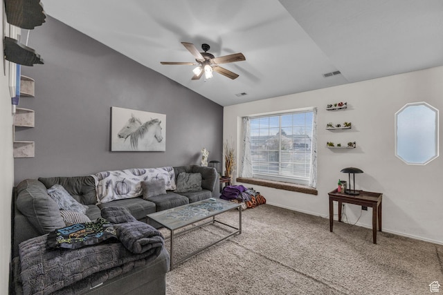 carpeted living area featuring a ceiling fan, visible vents, baseboards, and lofted ceiling