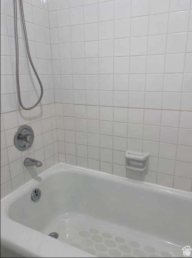 full bath featuring shower / bath combination