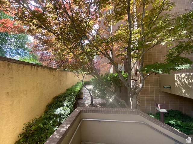 view of patio / terrace featuring fence