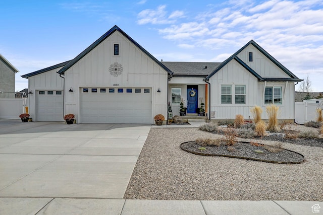1002 E 2680 S, Heber City, UT 84032 - modern inspired farmhouse with board and batten siding, driveway, a garage, and fence