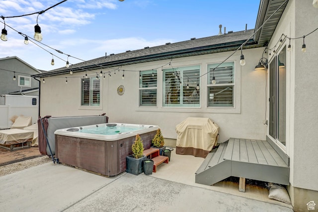 1002 E 2680 S, Heber City, UT 84032 - view of patio with fence and a hot tub