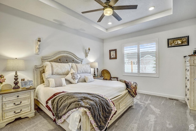 1002 E 2680 S, Heber City, UT 84032 - bedroom featuring a tray ceiling, baseboards, light colored carpet, and recessed lighting
