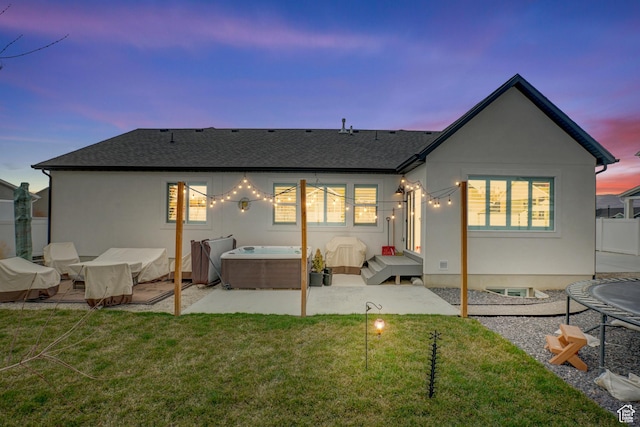 1002 E 2680 S, Heber City, UT 84032 - rear view of property with a patio, a shingled roof, a hot tub, and a yard