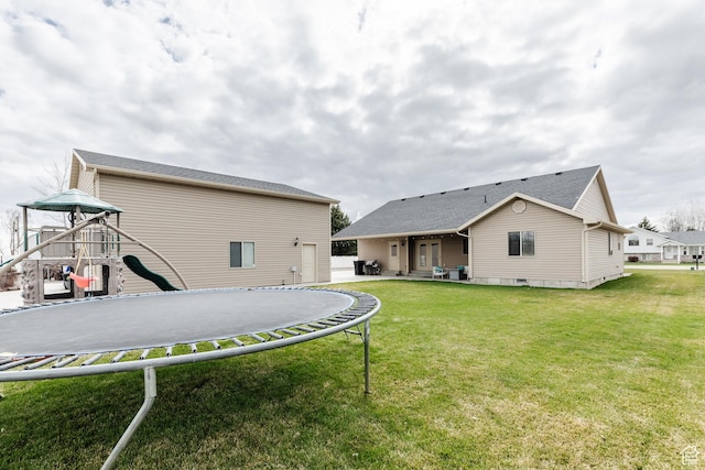 787 S 2nd W, Preston, ID 83263 - view of yard featuring a playground, a patio area, and a trampoline