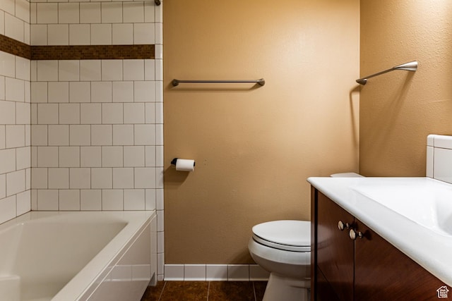 615 W Jefferson Pl, Sandy, UT 84070 - full bath featuring tile patterned floors, toilet, vanity, and baseboards