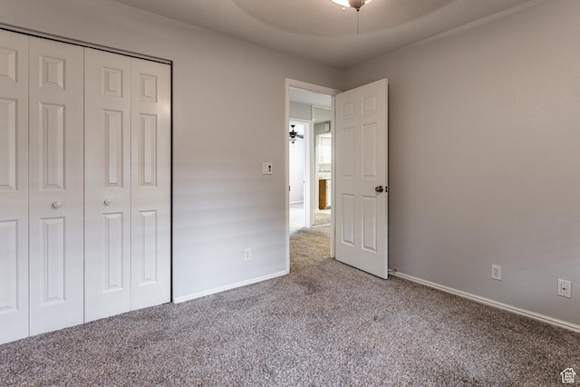 615 W Jefferson Pl, Sandy, UT 84070 - unfurnished bedroom featuring baseboards, a closet, and carpet