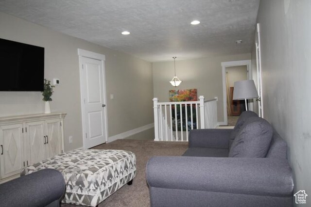 987 W 880 N, American Fork, UT 84003 - carpeted living area with baseboards, a textured ceiling, and recessed lighting
