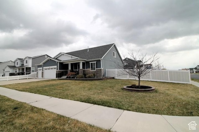 987 W 880 N, American Fork, UT 84003 - view of front of property featuring concrete driveway, a garage, fence, and a front lawn