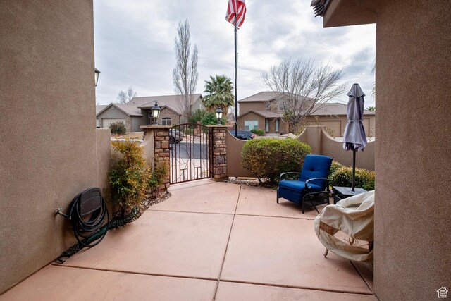 931 E Bramble Way, Washington, UT 84780 - view of patio with a gate and fence