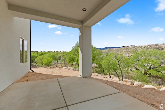 view of patio with a mountain view