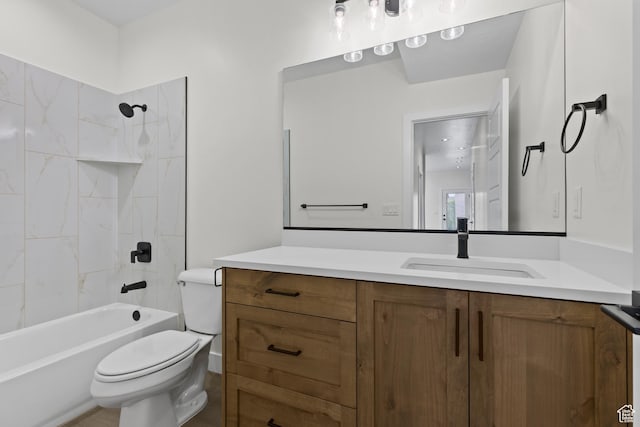 bathroom featuring bathtub / shower combination, toilet, and vanity