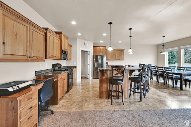 3182 N 1350 W, Pleasant View, UT 84414 - kitchen with black appliances, a breakfast bar area, an office area, a kitchen island, and recessed lighting