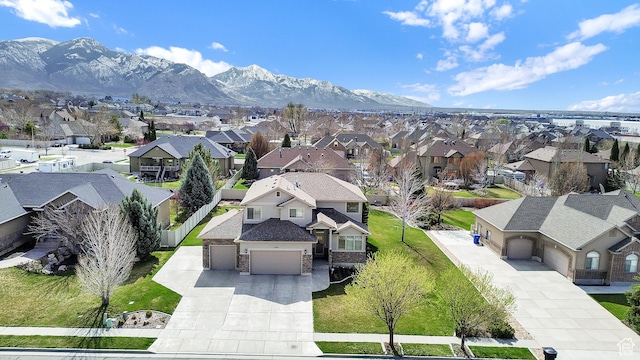 3182 N 1350 W, Pleasant View, UT 84414 - aerial view of residential area with mountains
