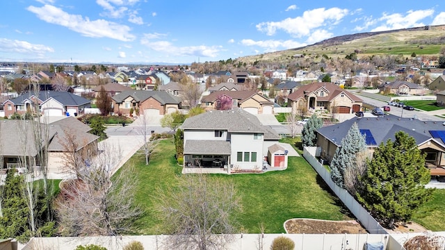 3182 N 1350 W, Pleasant View, UT 84414 - aerial view of residential area featuring a mountain backdrop