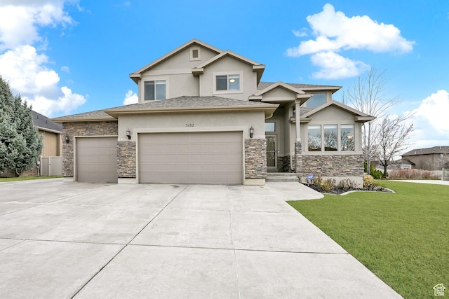 view of front of property with driveway, a front yard, stone siding, stucco siding, and an attached garage