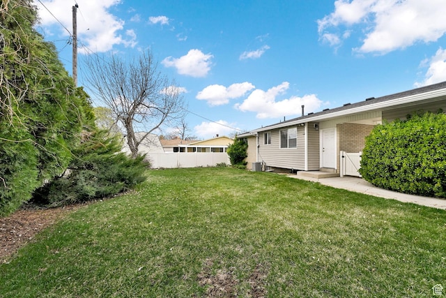 view of yard with fence