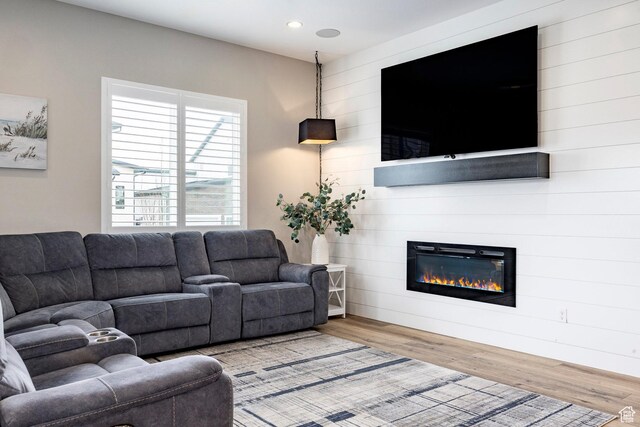 14902 S Fawley Ln, Herriman, UT 84096 - living area featuring recessed lighting, a large fireplace, and wood finished floors