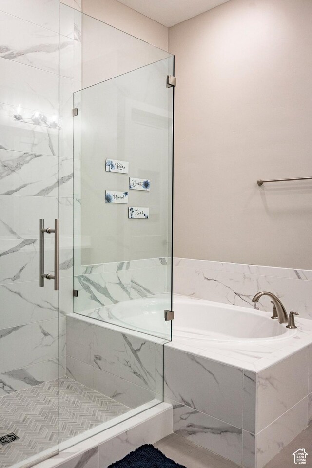 14902 S Fawley Ln, Herriman, UT 84096 - full bath featuring a marble finish shower and a garden tub