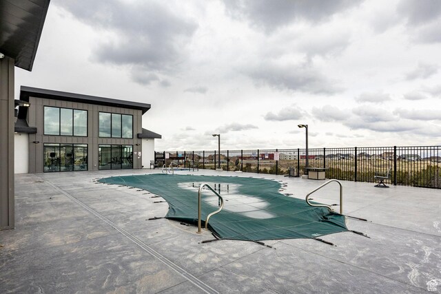 14902 S Fawley Ln, Herriman, UT 84096 - community pool featuring a patio and fence