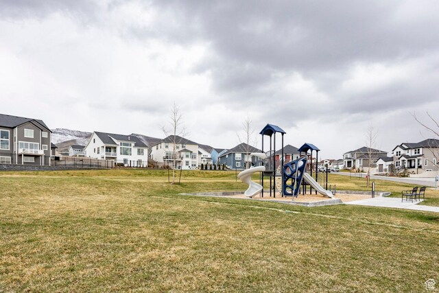 14902 S Fawley Ln, Herriman, UT 84096 - communal playground with a residential view, fence, and a lawn