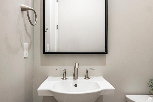 14902 S Fawley Ln, Herriman, UT 84096 - half bath featuring a sink and toilet