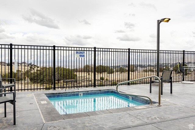 14902 S Fawley Ln, Herriman, UT 84096 - view of swimming pool featuring fence