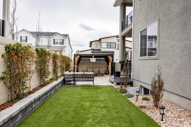 14902 S Fawley Ln, Herriman, UT 84096 - view of yard with a patio, a gazebo, outdoor lounge area, and a fenced backyard