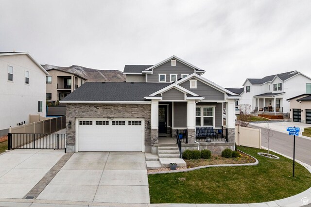 14902 S Fawley Ln, Herriman, UT 84096 - craftsman inspired home featuring a porch, fence, a front lawn, concrete driveway, and an attached garage