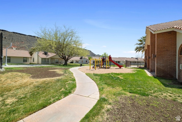 exterior space with a residential view and playground community