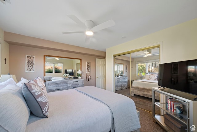 bedroom with carpet, a closet, and ceiling fan