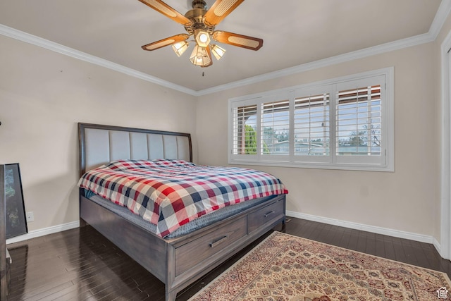 bedroom with dark wood-type flooring, ornamental molding, and baseboards