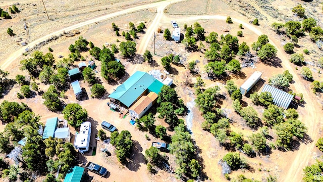 drone / aerial view featuring a desert view