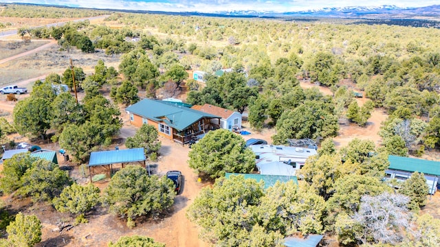 aerial view featuring a forest view