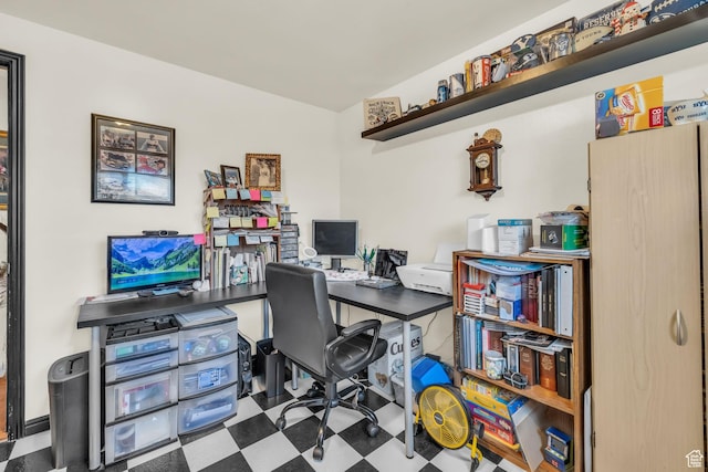 home office with tile patterned floors