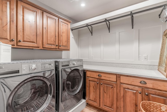 1255 W 3300 N, Pleasant View, UT 84414 - clothes washing area with cabinet space and washer and clothes dryer