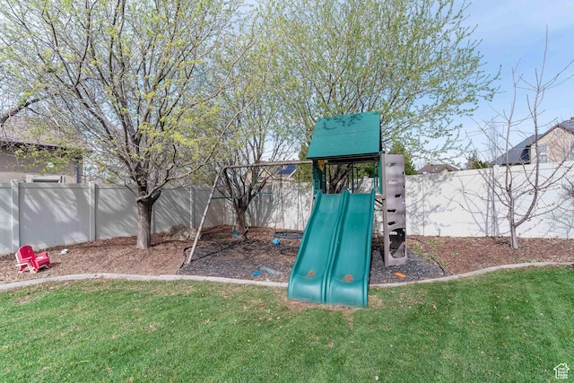 1255 W 3300 N, Pleasant View, UT 84414 - view of play area featuring a lawn and a fenced backyard