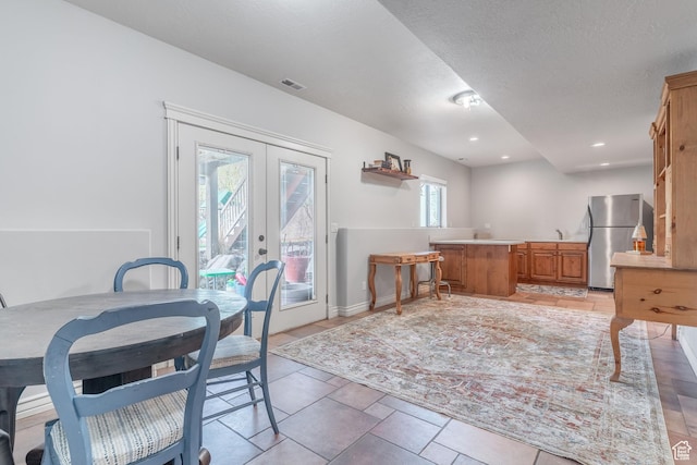 1255 W 3300 N, Pleasant View, UT 84414 - dining area featuring recessed lighting, french doors, baseboards, a textured ceiling, and visible vents