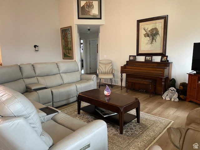 living room with wood finished floors