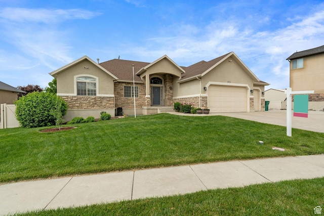 2711 N Deer Meadow Dr, Lehi, UT 84043 - ranch-style home featuring stucco siding, an attached garage, driveway, and stone siding