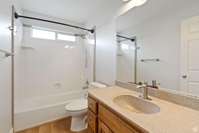 2711 N Deer Meadow Dr, Lehi, UT 84043 - full bathroom with wood finished floors, toilet, washtub / shower combination, and vanity