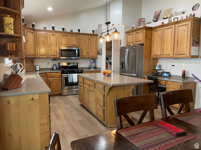 kitchen featuring open shelves, a center island, stainless steel appliances, a sink, and light wood-style floors