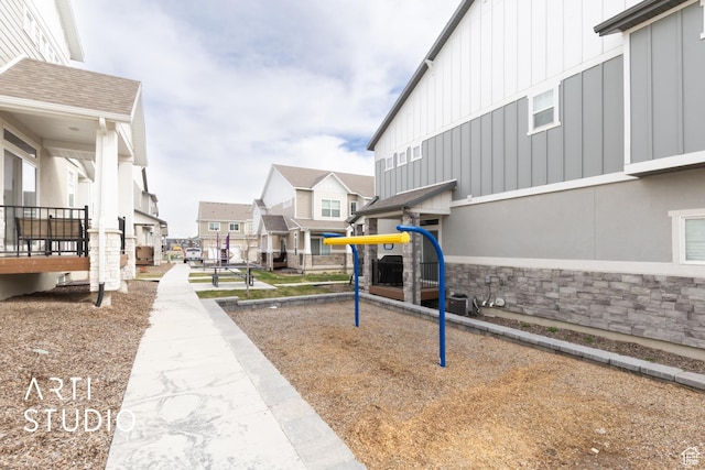 view of community with a residential view and playground community