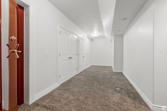 13053 S 1300 W, Riverton, UT 84065 - corridor with carpet flooring, a textured ceiling, and baseboards