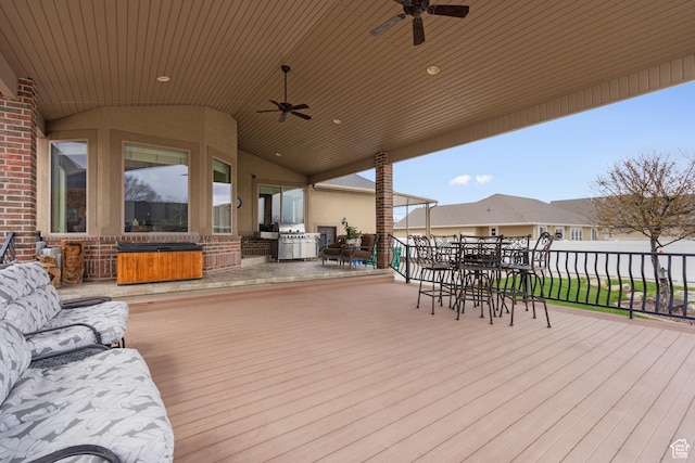 13053 S 1300 W, Riverton, UT 84065 - deck with an outdoor kitchen, a ceiling fan, and outdoor dining area